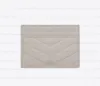 Portefeuille porte-cartes en cuir véritable de haute qualité Hommes Femmes Titulaires Luxurys designer fashion Coin Ball pattern Lambskin Mini Wallets Key Pocket Fente intérieure