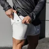 Dubbelskikt jogger shorts män 2 i 1 korta byxor gym fitness inbyggd i fickan bermuda snabb torr strand manlig svettbyxor 220722
