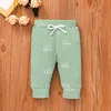 3 pezzi Baby Boy Girls Set di abbigliamento Sun Print Button Design Pagliaccetto a maniche lunghe a costine Pantaloni elasticizzati e berretto Set 1057 E3