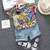 Cool Kid Boys Summer Desse Outfit met Sunhat Fashion Graffiti Short Sleeved T -shirt Denim shorts Set kinderbroek kleding 220620