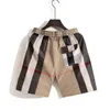 Designer -Pullover Casual Hosen für Männer Sommer Beachhosen Mode Herren Shorts Loose Style Plaid Color Men Jeans großer Größe Polo