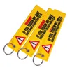 Popular Jewelry Embroidery Keychains Pendant Yellow Embroidered Word Warning Danger Warning Sign Bicycle Keychain