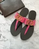 Дизайнерские тапочки Женщины скользят туфли в туфли летние сексуальные мужские дизайнеры роскоши настоящие кожаные сандалии старые цветочные шлепанцы Полоса