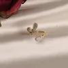 Klusterringar koreanska modesmycken utsökta kopparinlägg zirkonfjäril Opal kvinnlig öppning justerbar pekfinger ringkluster