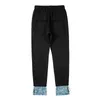 Pantaloni da uomo Pantaloni streetwear urbani Patchwork Pantaloni da jogging Fiore di anacardi Denim Terry Pantaloni sportivi con coulisse Pantaloni da jogging alla modaUomo