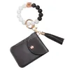 Bracelet en cuir PU portefeuille porte-clés bijoux glands bracelet porte-clés porte-carte sac couleur bonbon silicone perlé bracelet porte-clés accessoires de mode