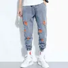 Mode rippade jeans för män 2020 nya fyra säsong lösa harem jeans streetwear hip-hop stil hål byxor elastiska midja byxor g0104