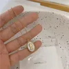 한국의 빈티지 워터 드롭 스타 라운드 곰 타원형 펜던트 목걸이 기하학적 금색 티타늄 강철 목걸이 보석 250 D3