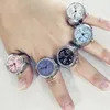 Mode créative anneaux Montre de luxe couleur argent Cool Quartz bague Montre Couple montres Reloj Mujer Montre 9 couleurs