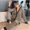 T081 2PCS PAJAMAS FEMMES SETS FEMME PAJAMA PARTIE SUMBRE V COUP DESIG