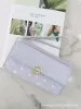 محافظ 2021 المرأة محفظة أزياء طباعة طويلة سستة الهاتف المحمول الكورية متعددة البطاقات تغيير حقيبة يد الصيف