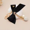 Nyckelringar Elegant band Bow-Knot Crystal Ball Crown Keychain for Women Girl Cute Pompom Fur Key Chain Bags Charms Keyring Party Gift Enek22