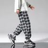 Été Plaid pantalons décontractés hommes lâche Hip Hop pantalon coréen mâle Harem surdimensionné Joggers pour la mode Streetwear 220330