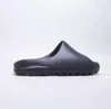 EU48 hommes femmes diapositives pantoufle EVA chaussures noir blanc résine pur ocre motif os sandale demi taille haute qualité avec boîte