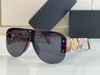 Nova tendência óculos de sol masculinos designer coberto sem aro escudo forma armação de óculos de metal de alta qualidade polarizador de condução ao ar livre rosa b9477787