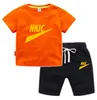 Nuovo 2 pezzi Novità Estate Baby Boy Sport Abiti Set di vestiti Abbigliamento per ragazze Solid Top T-Shirt Pantaloncini Bambini Tuta per bambini Alta qualità