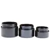 Emballage cosmétique Pots de crème en verre noir brillant Bouteille rechargeable Couvercle blanc Pots de crème pour le visage vides portables de haute qualité 20g 30g 50g