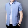 Chemises décontractées pour hommes été hommes lâche mince coton lin à manches courtes mode masculine col rabattu couleur unie 4XL vêtements E78Men's