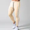 Herrenhosen Herbst Muskel -Männer Leggings Sport Freizeit Schweiß Absorption gestreift