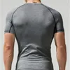 T-shirt da uomo Quick Dry Fitness Sport all'aria aperta Running Arrampicata Maniche corte Collant Bodybuilding Top Gym Train Compression T-shirt 220507