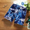 Shorts masculinos Summer Summer Solto Pijama de pijamas de praia Praia possui calças de lazer de cinco pontos de calças grandes de natação