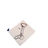 Keychain car keychain old flower bottle opener female cute high-grade male lanyard package pendant253K