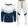 Herrespår faller vintermäns hoodies pullover 2 bit set sportbyxor färgblock sportkläder kostym modekläder casual byxor