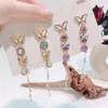 Dangle żyrandol koreański błyszczący motyl kropli kolczyki dla kobiet elegancka perłowa frędzla pendientes impreza biżuteria