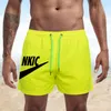 2022 Shorts de basquete masculinos respiráveis para o verão Calças de moletom de secagem rápida com impressão de letras da marca Mesh Shorts esportivos rosa Casual S-4XL