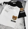 Barnmode T-shirts Toppar T-shirts pojkar flickor tecknad björn broderade brev bomull kortärmad Pullover barnkläder Lös stil
