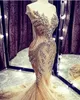 Luxury Crystals Beaded Gold Evening Klänningar Elegant Arabisk Dubai Glitter Sequined Formal Occasion Grows Short Sleeve Long Mermaid Prom Dress Women Robe de Soriee