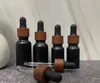 Black frosted glass dropper bottles essential oil perfumes bottle with wood grain plastic cap 5ml to 100ml SN4568