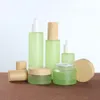 Matt green glass cosmetic jars pump bottles with plastic wood grain cap 20g 30g 50g 20ml 30ml 40ml 60ml 80ml 100ml 120ml body lotion face cream toner water containers