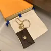 Designer Letter Wallet Keychain Keyring Fashion Mens Womens Purse Pendant Car Chain Charm Flower Mini Bag Trinket Gift Accessories221L