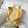 Borsa personalizzata a spalla singola con manico Borsa tote in tela di cotone organica pieghevole a chiusura lampo morbida e resistente