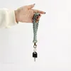 Mode tissé à la main porte-clés pendentif accessoires bricolage Boho bracelet coton corde ornement Crochet porte-clés lanière cadeau de vacances