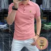 T-shirt polo décontracté de couleur unie pour hommes Logo décorer bonbons couleur vive mâle revers polo hauts de haute qualité vêtements pour hommes de haute qualité M-4XL