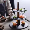 Rätter plattor japansk stil flerskiktskakor kaka bricka trä fruktdessert sushi stativ festival fest hem el kök användning