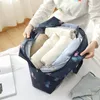 Nylonowe składane unisex torebka o dużej pojemności Kobiety wodoodporne torebki mężczyźni worki podróżne Organizator odzieży 220701