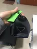 Porte-clés de luxe Mini sac designer joli portefeuille de changement fait à la main en cuir porte-clés mode hommes et femmes sac à main penda2595