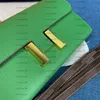 Designer Purse Togo woman Wallets Gold Buckle Whole cowskin Card holders Bags fashion Genuine leather Long wallet For lady 11 Colors 539