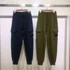 Stylista męskie spodnie do joggingu Modne wysokiej jakości spusty stóp wiązki stałe kolorowe spodnie stylistyczne czarny niebieski zielony zielony