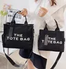 The Tote Bag Lady Luxury Designer Mini grande capacidade de lona lisa Bolsas de ombro de couro Crossbody com bolsas de bolsas de tira bolsas de bolsas PU