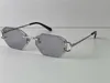 Buff Sonnenbrille Objektivfarben in Sonnenschein von kristallklarem bis dunklen Diamant -Design geschnittene Linse Randless Metall Rahmen Outdoor 0109565586