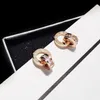 Corée des lettres de concepteur de Rome simple coréen 18K Rose Gold en acier inoxydable Retron Vintage Bouilles d'oreille Oreille d'oreille avec shini268u