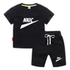 Zomer Kinderen Merk Kleding Sets Korte Mouw Wit zwart T-shirts Effen Elastische Taille Shorts Sport Pak Sets 2 STUKS Babykleding Outfits