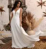 Crepe Stain Beach Wedding Dresses with Flare Long Sleeve Wrap Jacket 2022 Modest Bohemian Temple Summer Holiday Bridal Dress