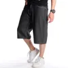 Jeans pour hommes été ample jambe large hommes court Hip-Hop mâle Skateboard Swag Baggy Capri pantalon noir broderie Denim grande taille 46