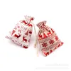 50 Pz / lotto Sacchetti di cotone abbronzante natalizio 10x14 / 13x18 cm Coulisse Gioielli Regalo Display Sacchetti di imballaggio Xmas Party Favor Candy Bags 220420
