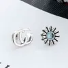 2023 Designer New Fashion Jewelry Dubbel Ancient Inlaid med Blue Topaz Stone Flower Asymmetric Earrings Women's Chrysanthemum Daisy